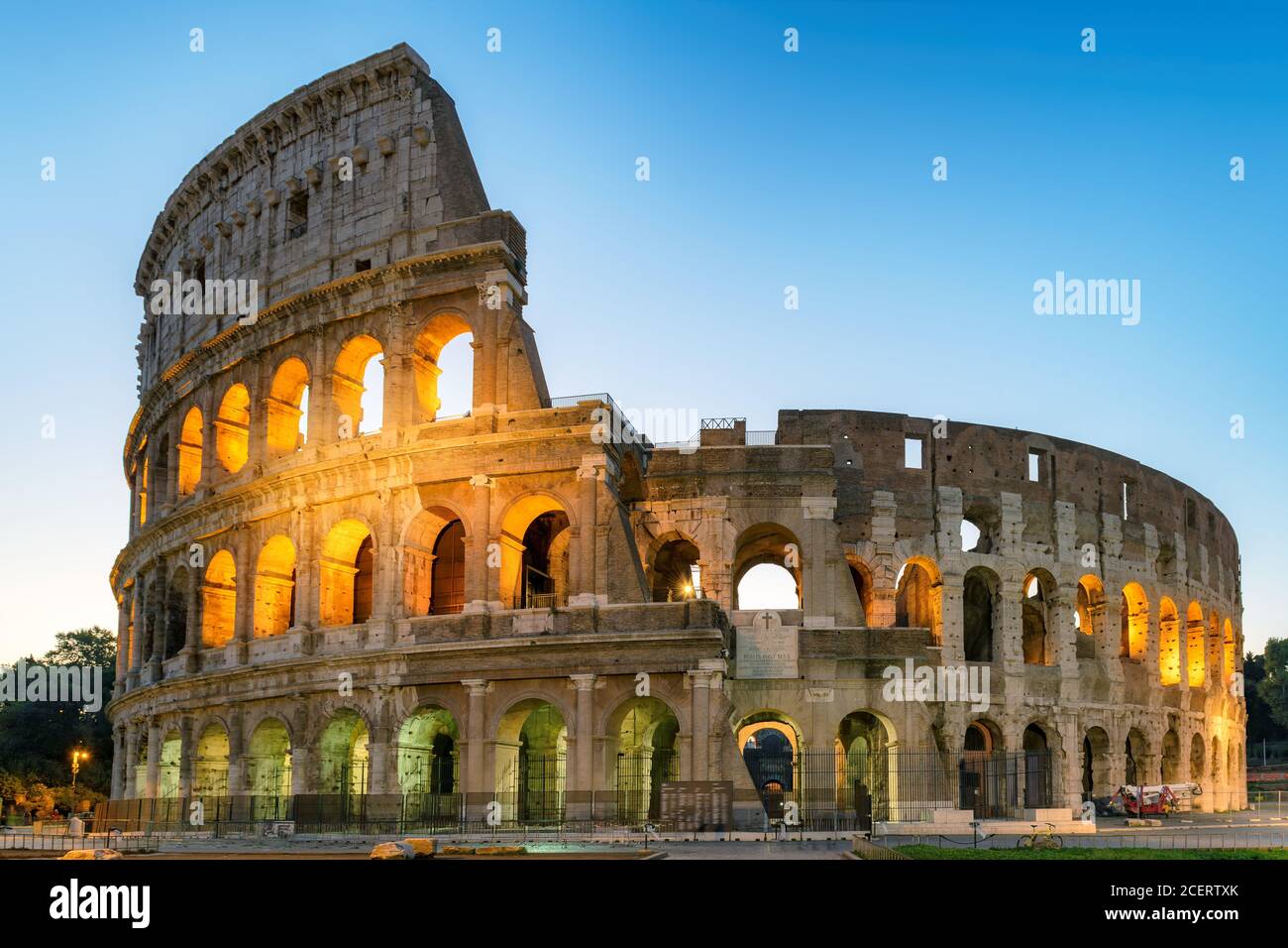 Famous Colosseum at sunrise in Rome, Italy, Stock Photo
