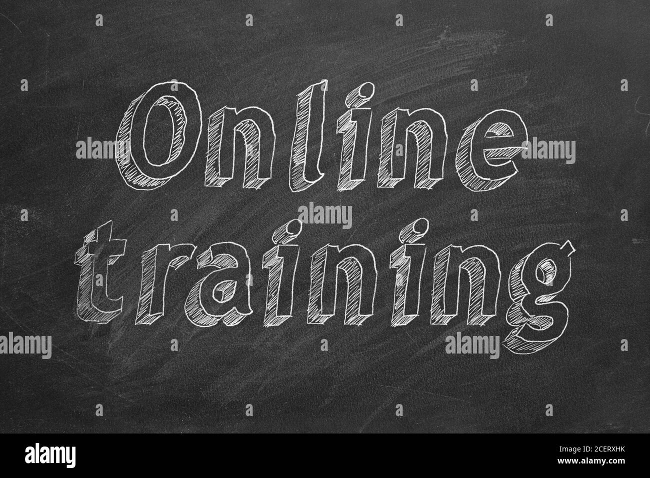 Hand drawing training" on black chalkboard Stock Photo Alamy