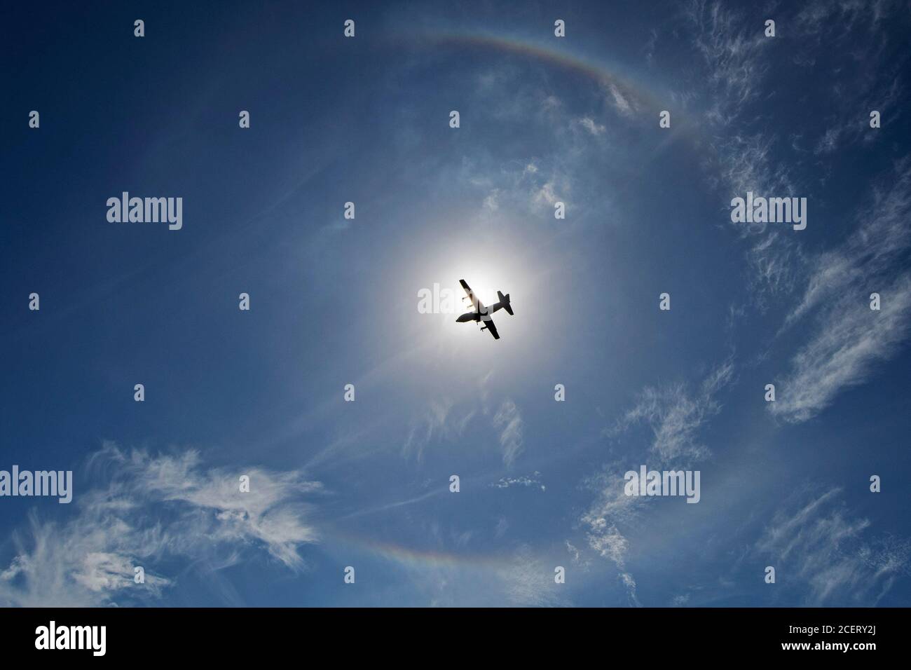 Singapore. 2nd Sep, 2020. A Republic of Singapore Air Force (RSAF) C-130 Hercules transport aircraft flies by the sun halo in Singapore on Sept. 2, 2020. Credit: Then Chih Wey/Xinhua/Alamy Live News Stock Photo