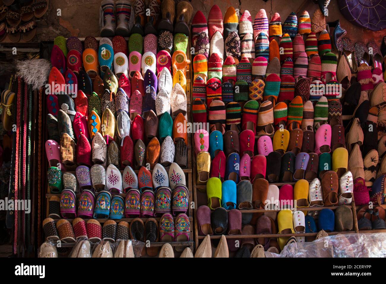 Leather babouches, Moroccan backless leather slippers for sale in the souk within the Medina,  Marrakesh Stock Photo