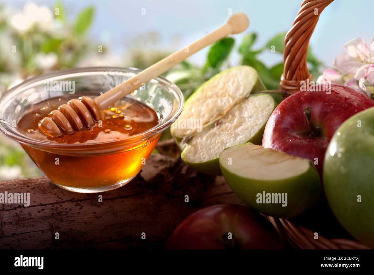 Fresh apples and honey on wooden table Stock Photo