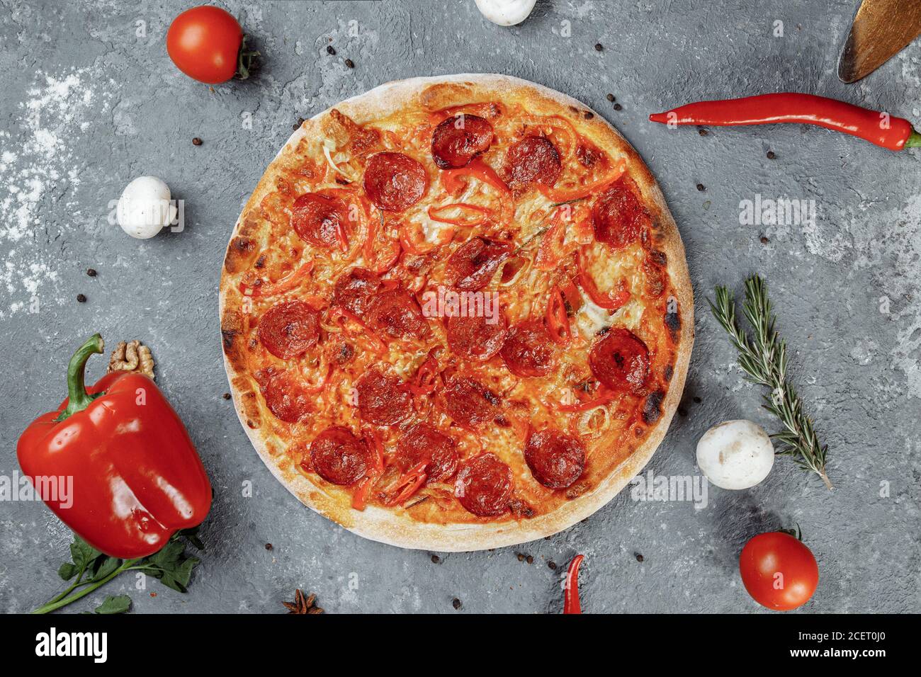 Thinly sliced pepperoni is a popular pizza topping in Americanstyle pizzerias Stock Photo Alamy