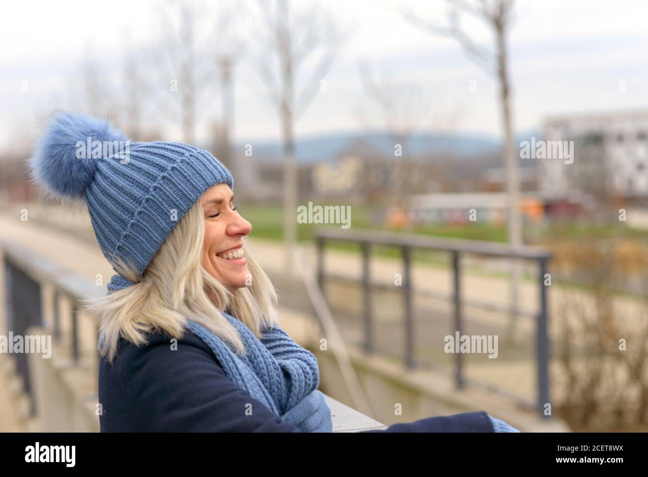 Woman in woolly hat hi-res stock photography and images - Alamy