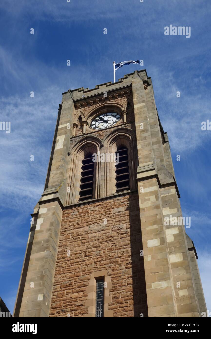 Clock Tower and flag, st Andrew Blackadder Church, North Berwick Stock