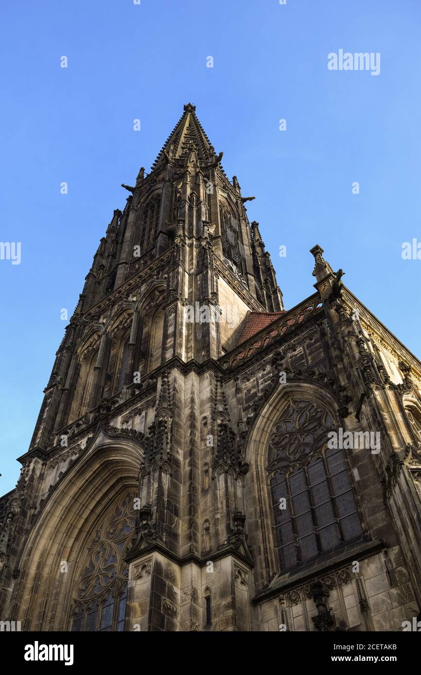 St. Lambert's Church, Muenster, Germany, steeple with cages of Muenster rebellion, famous ancient gothic church, tourist destination, Europe. Stock Photo