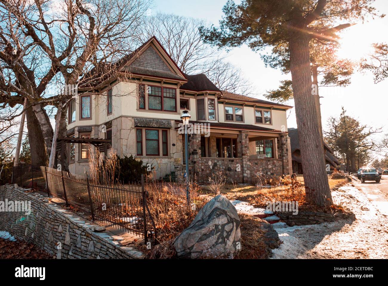Large house designed by Earl Young in Charlevoix Michigan Stock Photo
