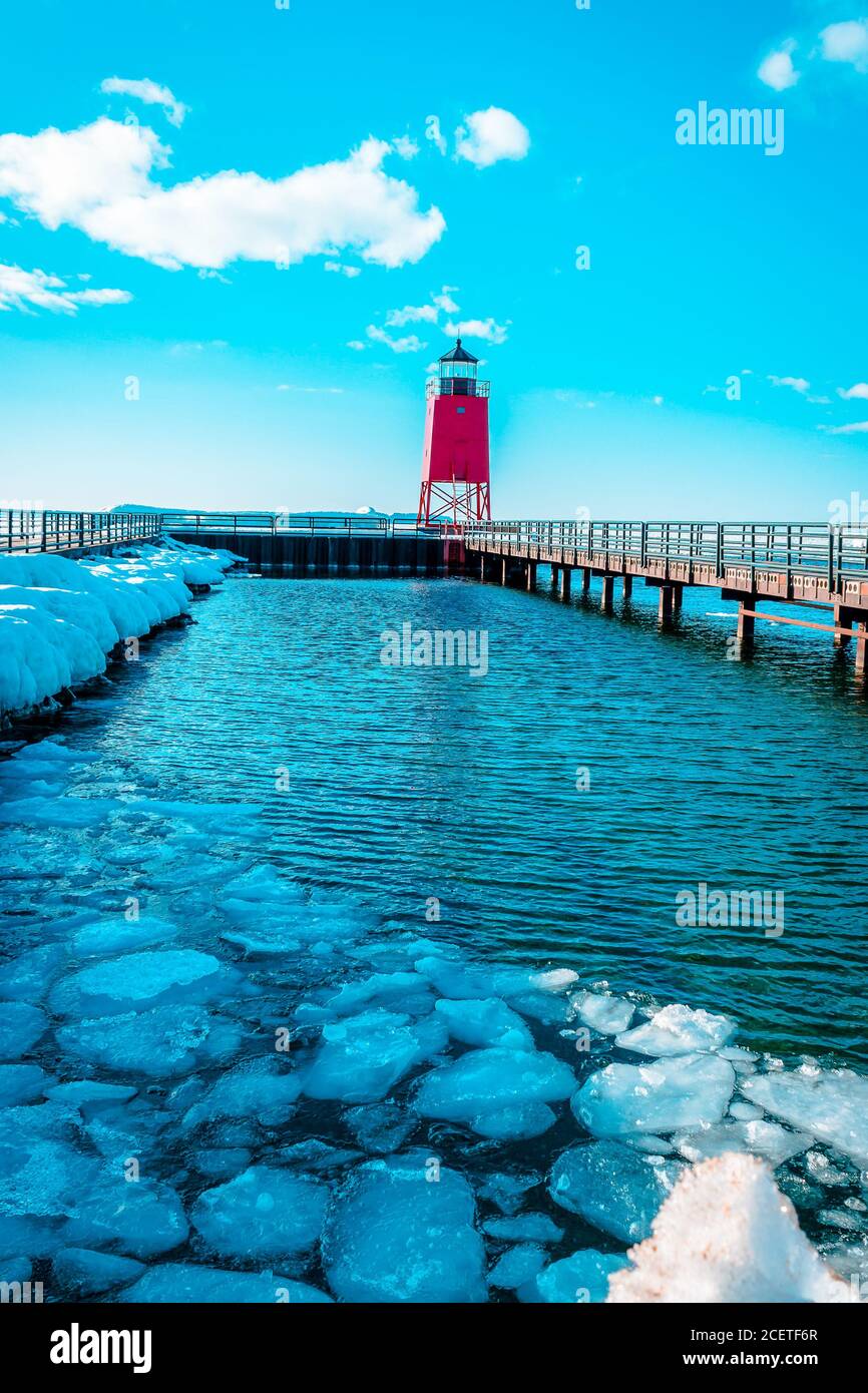 Small icebergs melting at the South Pier Lighthouse off of Lake ...