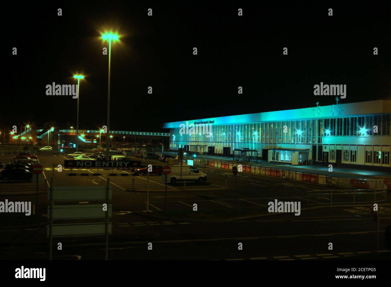 Glasgow Prestwick Airport, Ayrshire, Scotland,15 March 2014, Terminal building illuminated green for St Patrick's Day Stock Photo