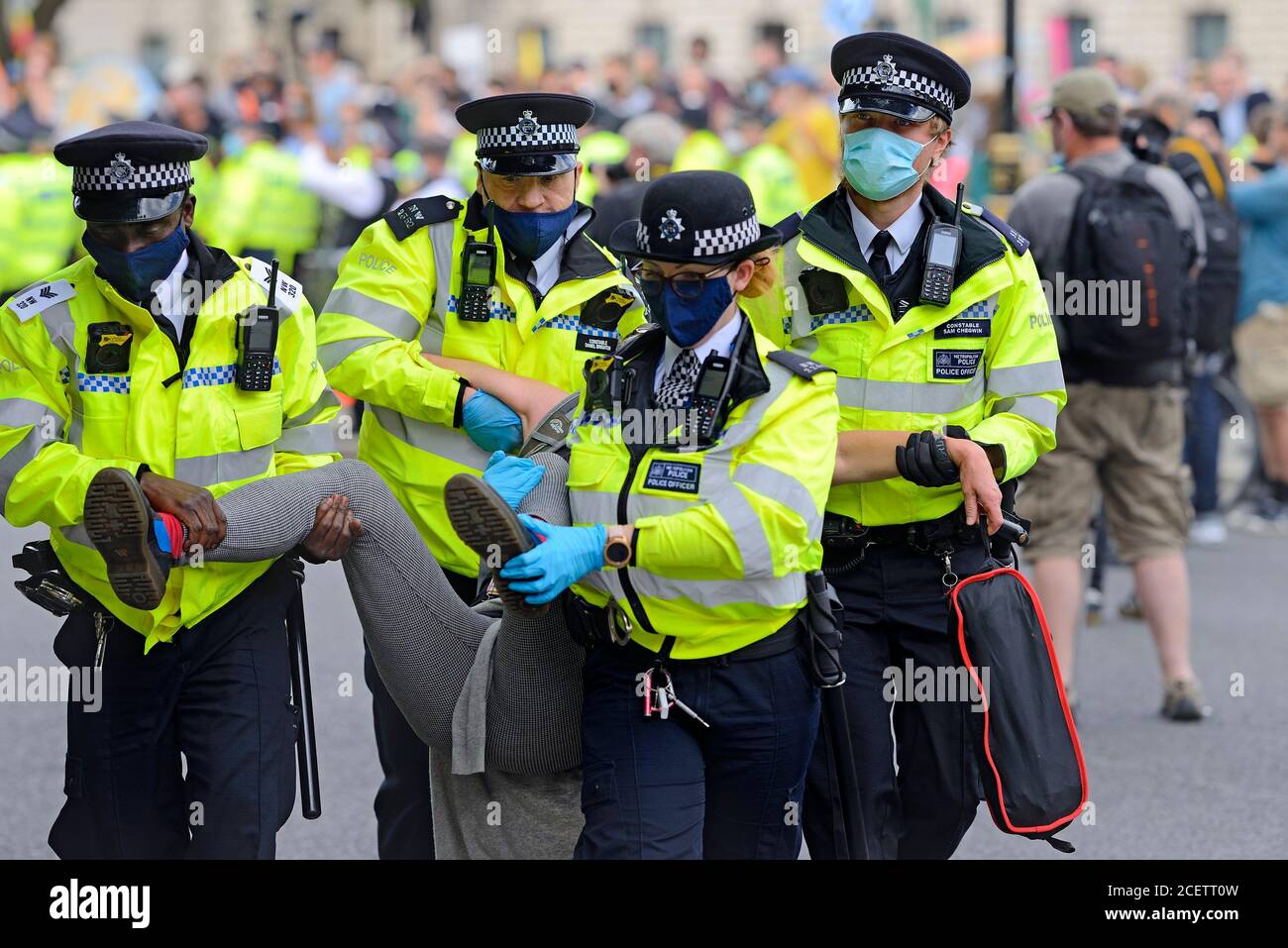 London, UK. Protester being arrested at an Extinction Rebellion protest in Parliament Square during the COVID pandemic 1st September 2020 Stock Photo