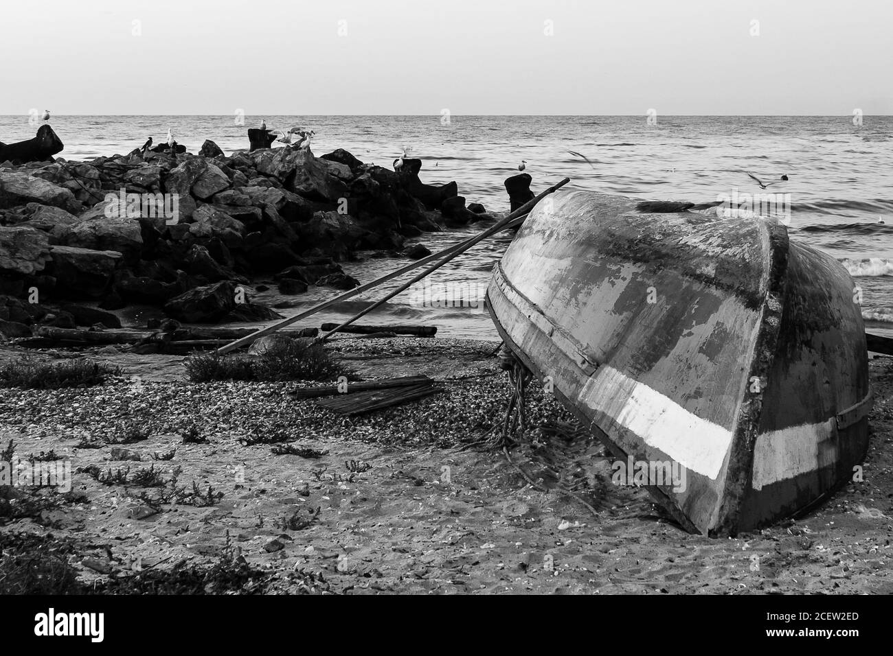 Boat on beach sand Black and White Stock Photos & Images - Alamy