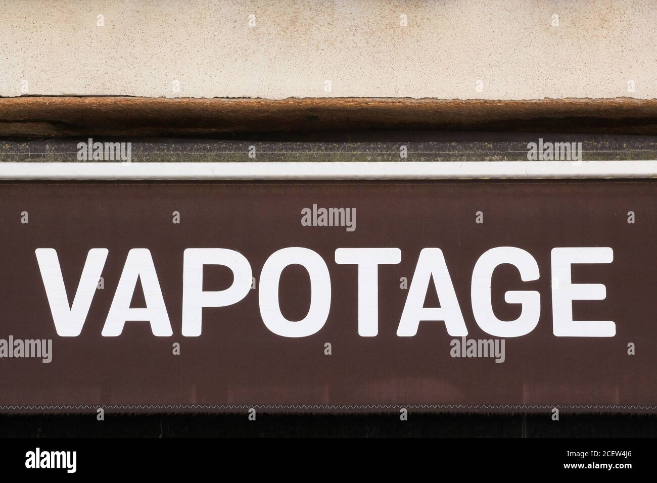 Vaping sign on a wall called vapotage in french language Stock Photo