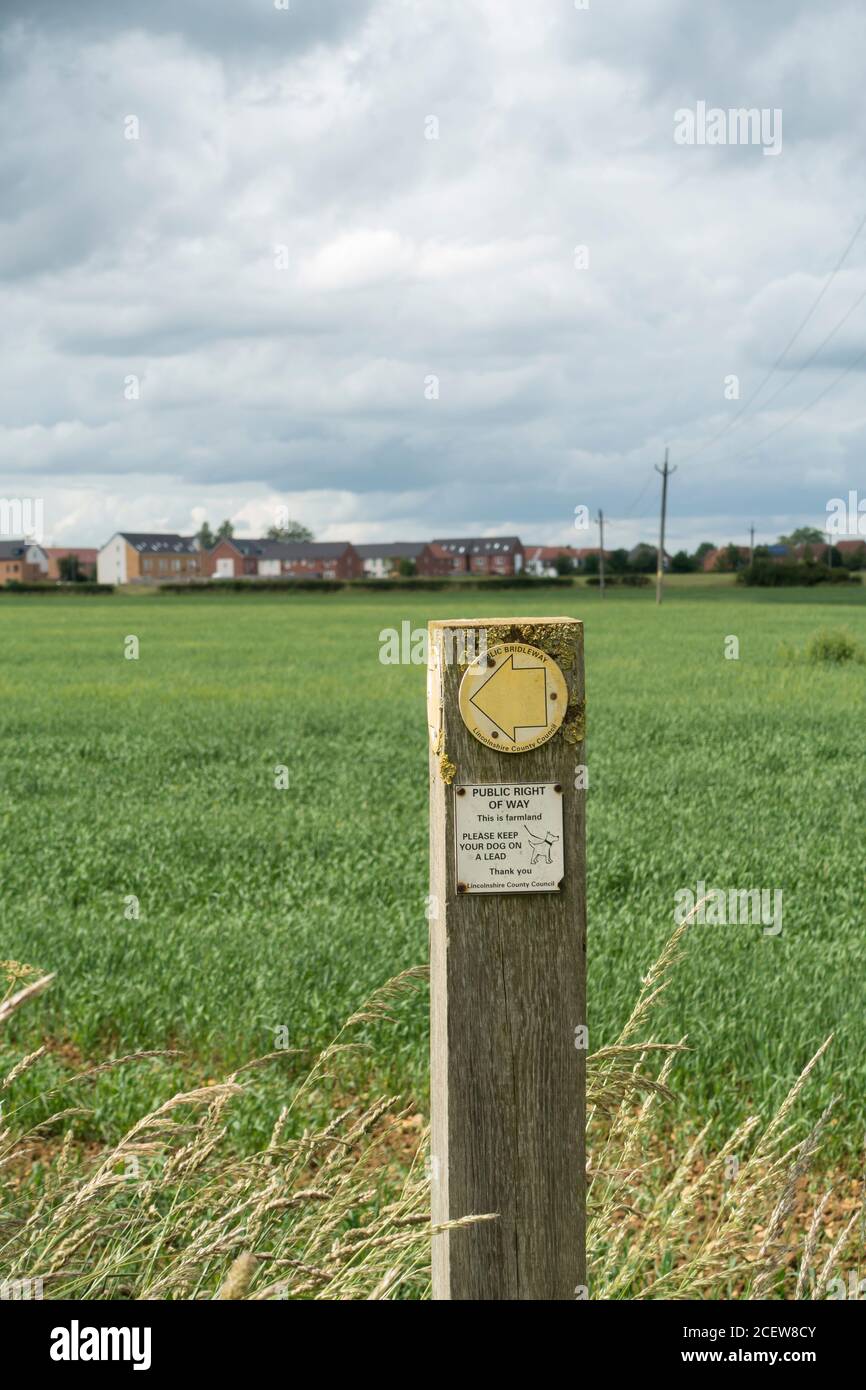 Public bridleway and public right of way signs on post indicating direction June 2020 Stock Photo