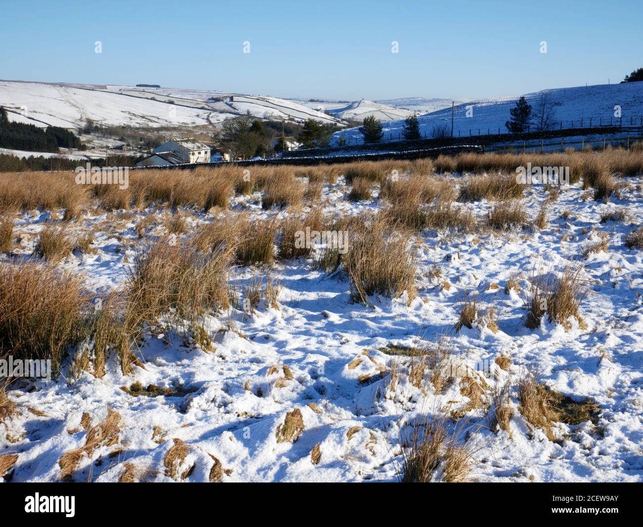 Snow-covered countryside towards Blacko Tower, near Barrowford, Lancashire, seen from the Newchurch to Barley Road.  Winter. Stock Photo
