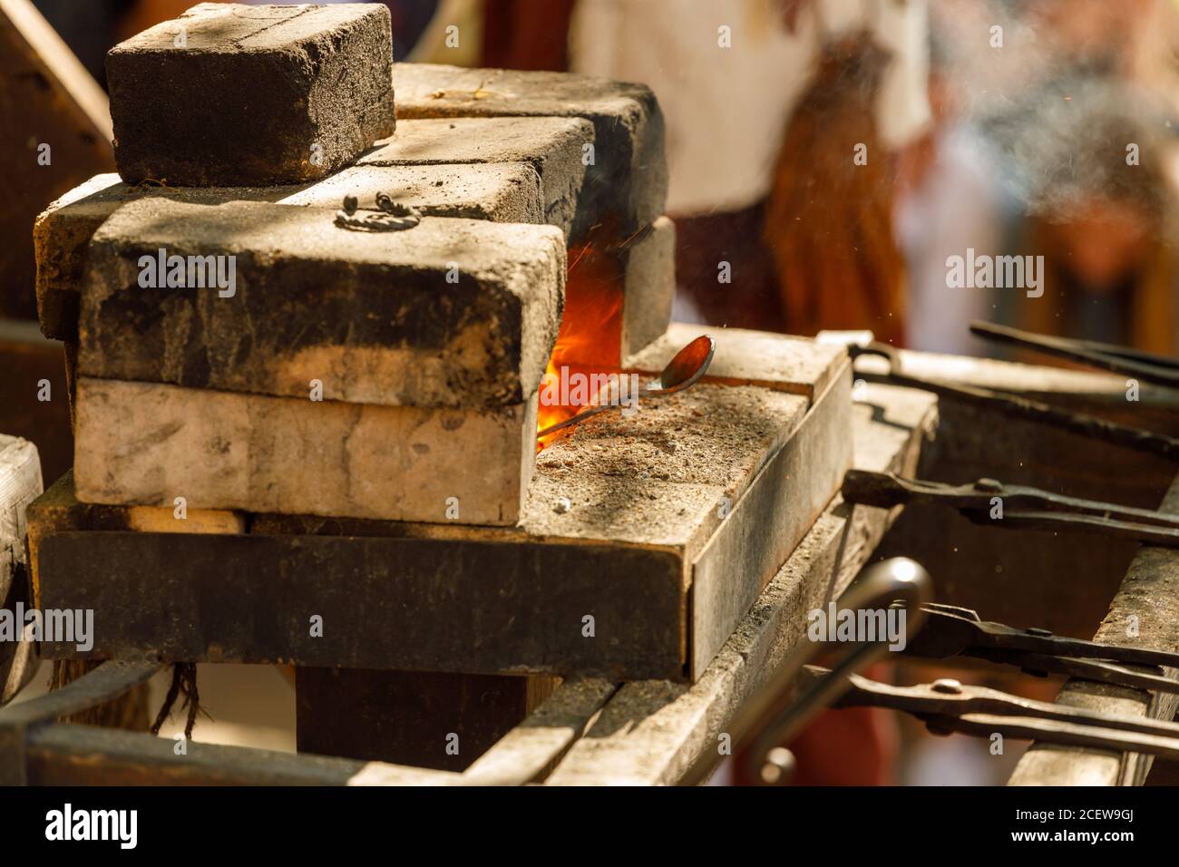 a burning forge made of bricks in nature Stock Photo
