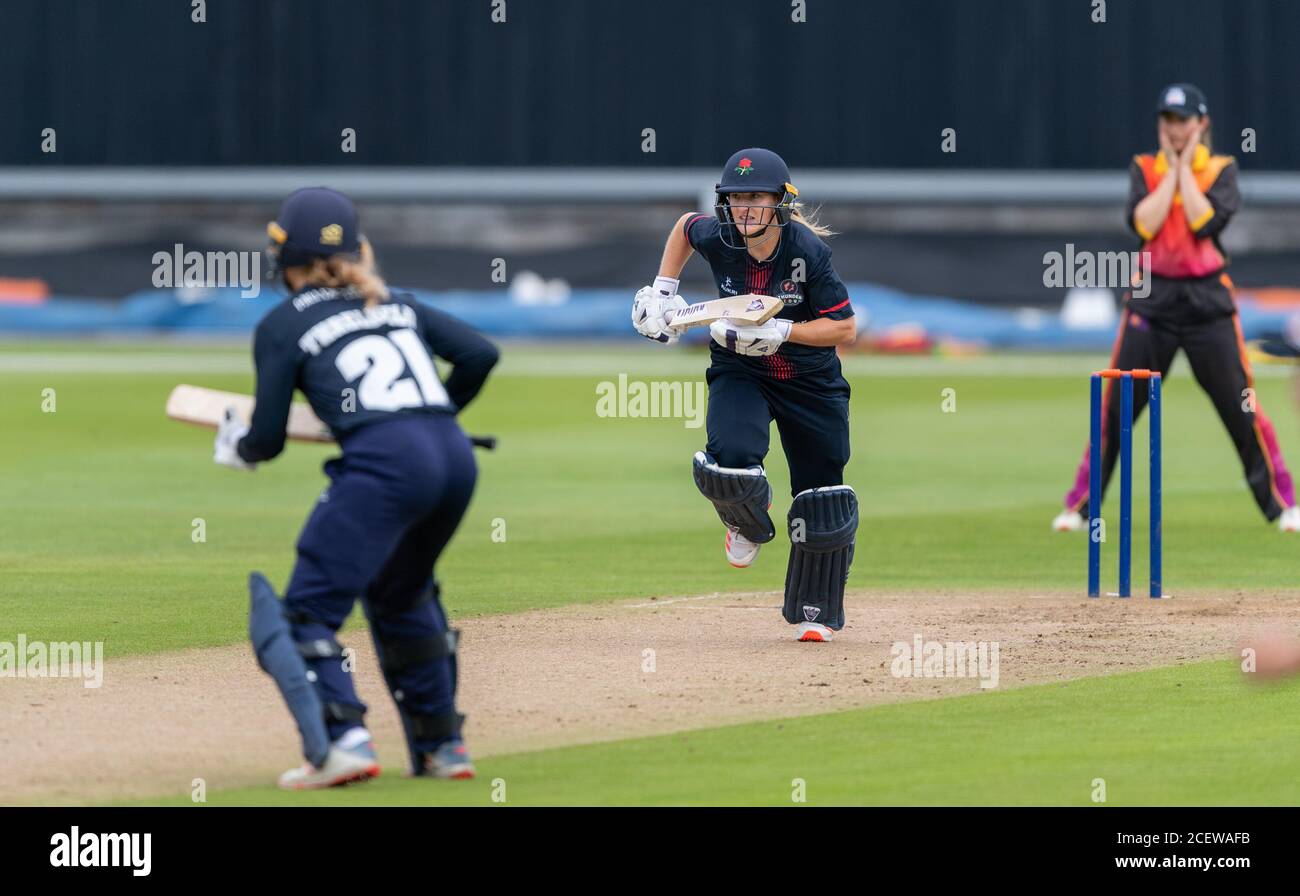 Thunder's Emma Lamb running between the wickets in a Rachael Heyhoe Flint Trophy match between Thunder and Central Sparks Stock Photo