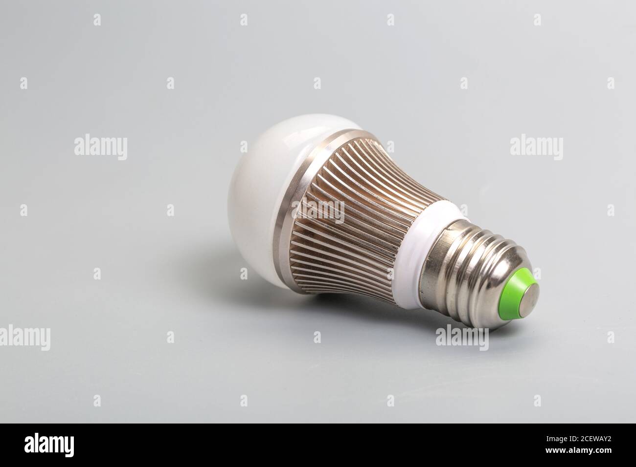 Glass bulb on gray background Stock Photo