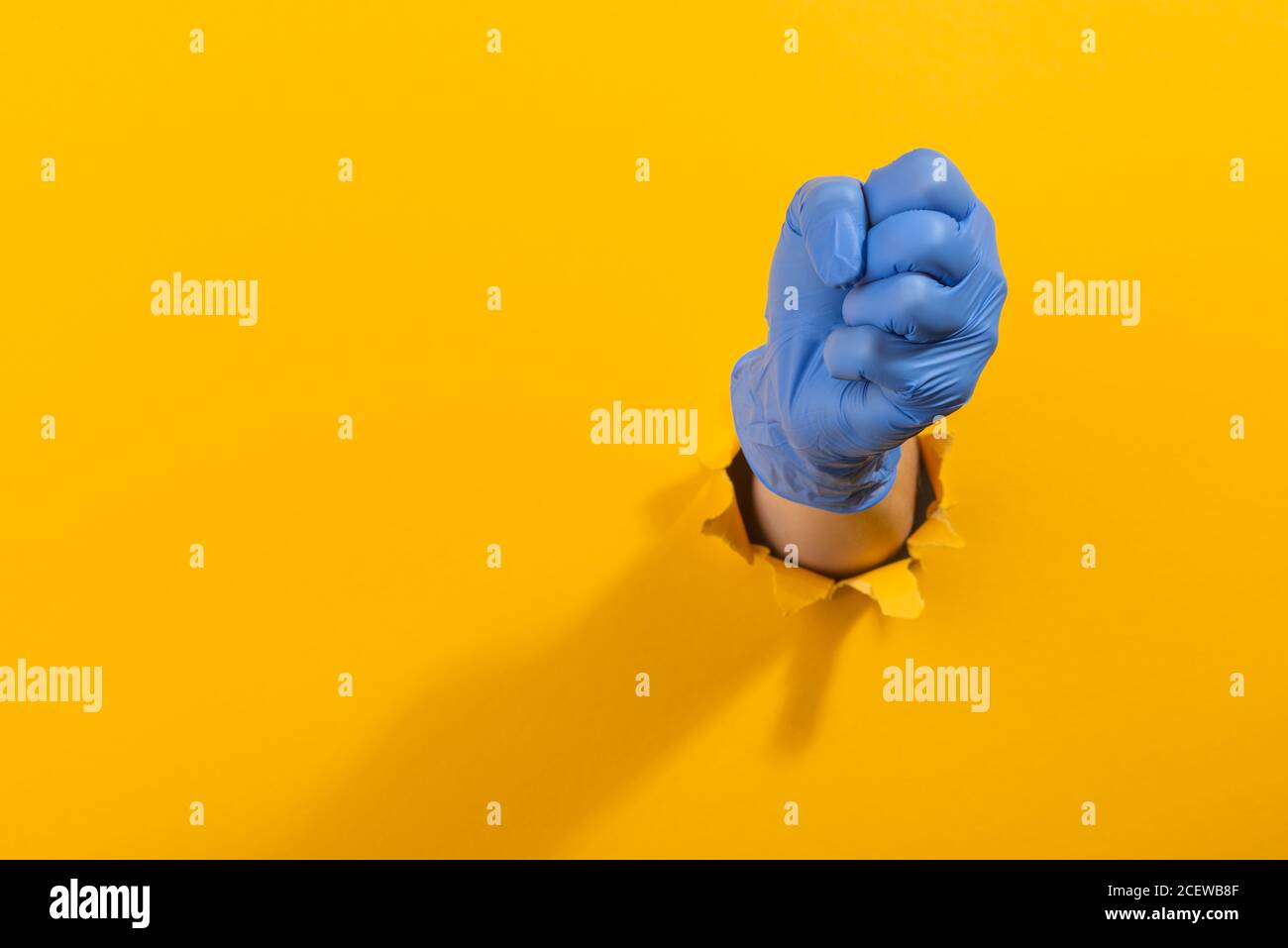 Latex glove fist hi-res stock photography and images - Alamy