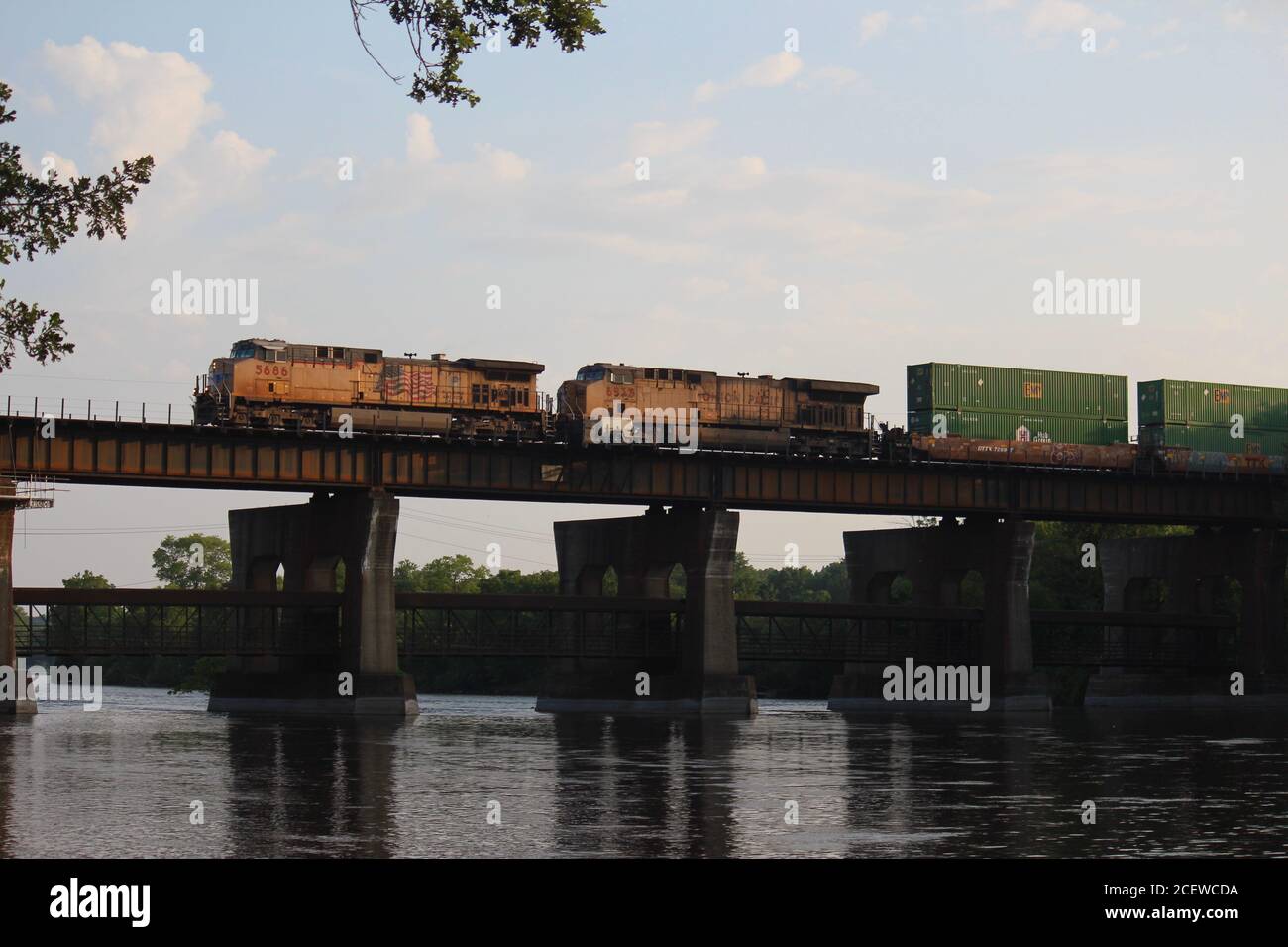 Union Pacific freight train heads east over the Fox River in Geneva