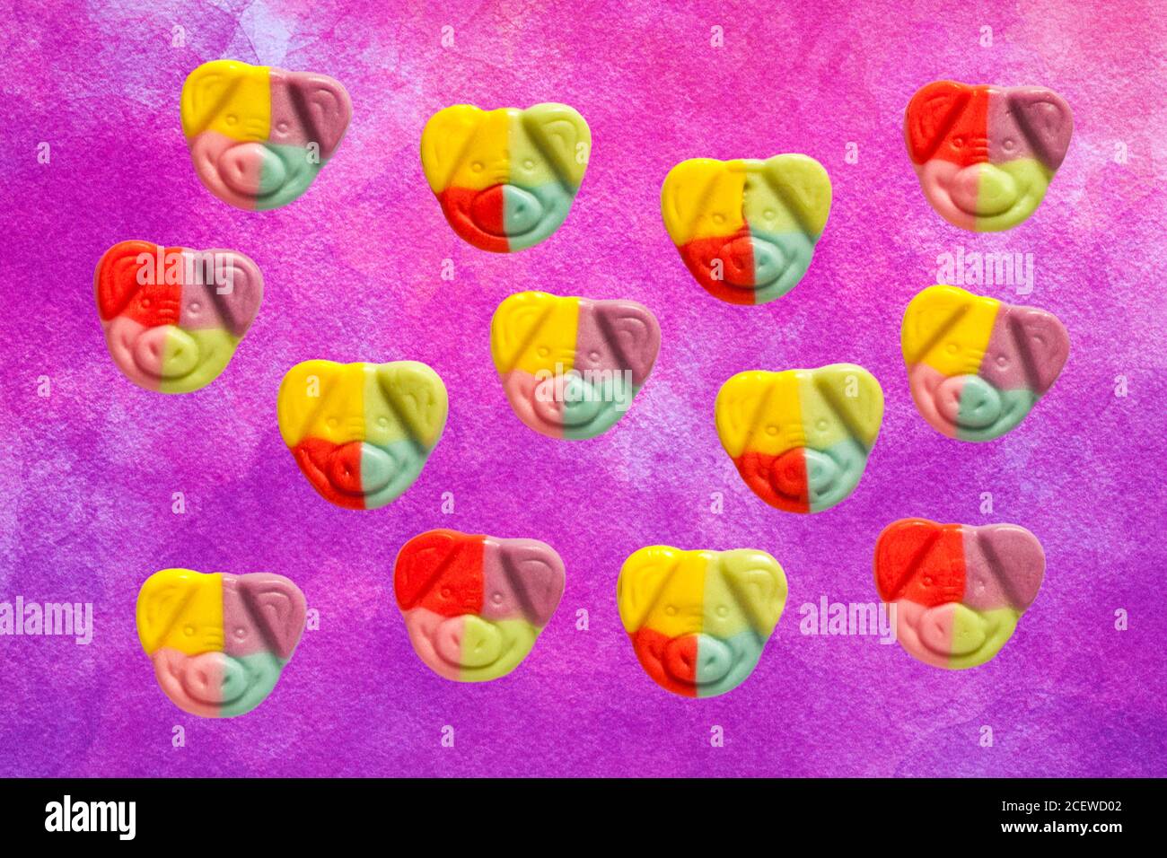 new Marks & Spencer percy pig party time sweets isolated on purple patterned background - made with real fruit juice Stock Photo