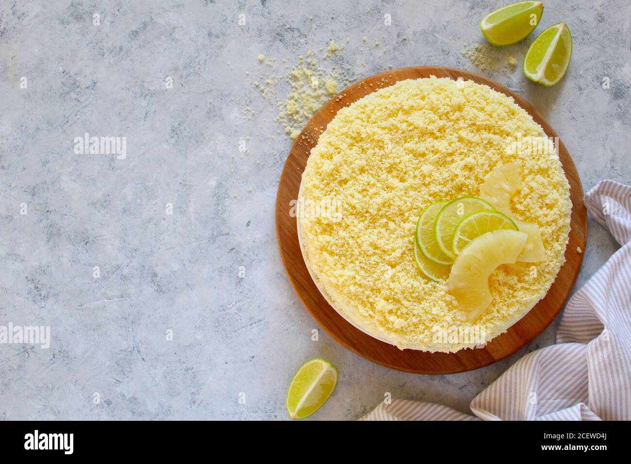 Mimosa cake with ananas. Top view with copy space. Stock Photo