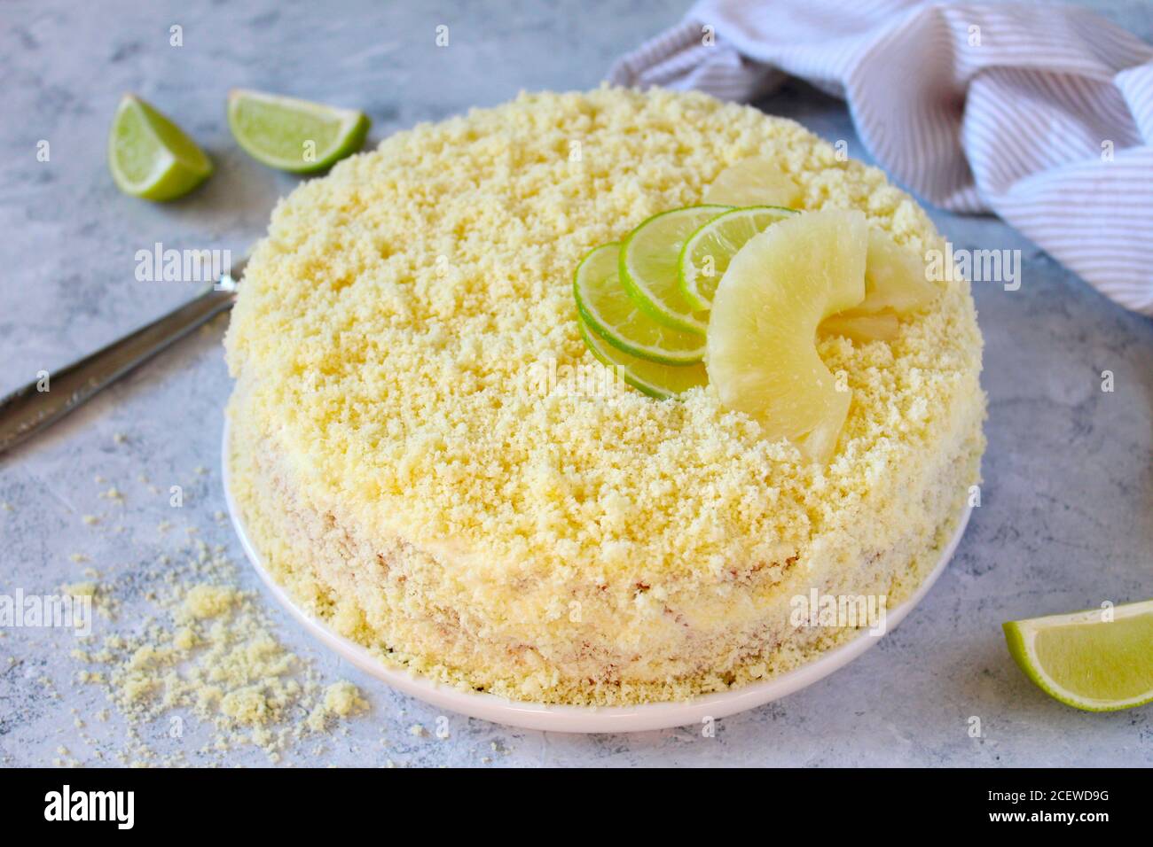 Mimosa cake with ananas. Top view with copy space. Stock Photo