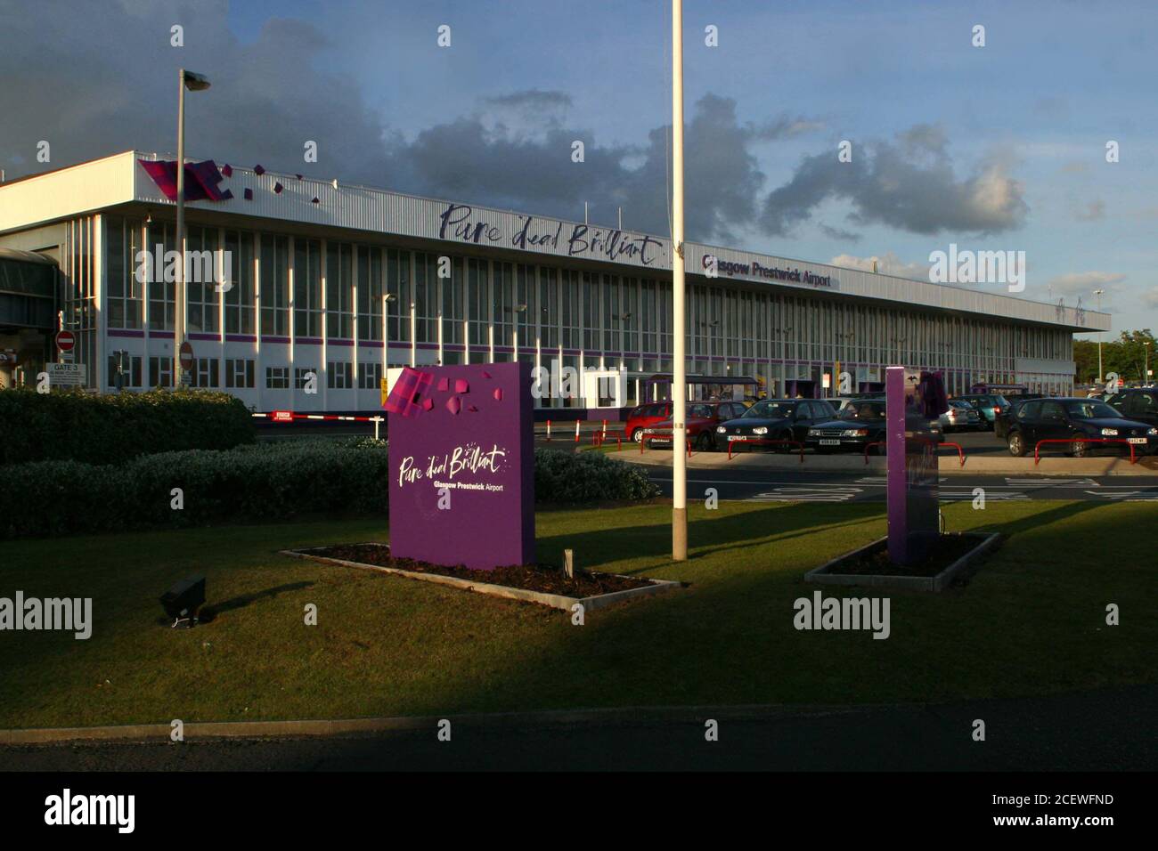 Glasgow Prestwick Airport, Ayrshire, Scotland. 19 May 2005. The  terminal building after rebranding . The branding by the owners New Zealand Compnay Infratel was and is controversial using the tag line ' Pure Dead Brilliant ' The airport has been nationlised by the Scottish goverment Stock Photo