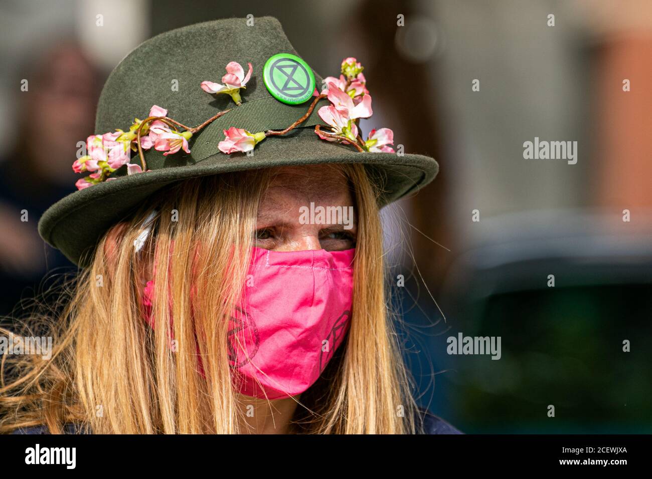 WESTMINSTER LONDON, UK - 2 September 2020 A climate activist wearing a protective facemarks from Extinction rebellion protests in Parliament Square due to the government’s failure to act on the climate and ecological emergency and demand the government act now to brings the Climate and Ecological Emergency Bill. Extinction rebellion have vowed to continue their protest over 12 days in London and across cities in the UK. Credit: amer ghazzal/Alamy Live News Stock Photo