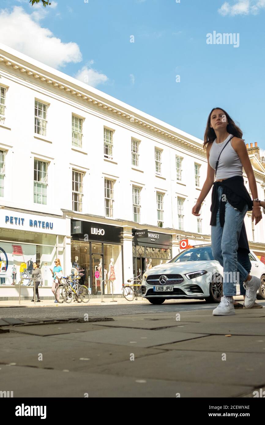London- August, 2020: Shoppers on the Kings Road, an upmarket area of fashion shops and restaurants in Chelsea area of south west London Stock Photo