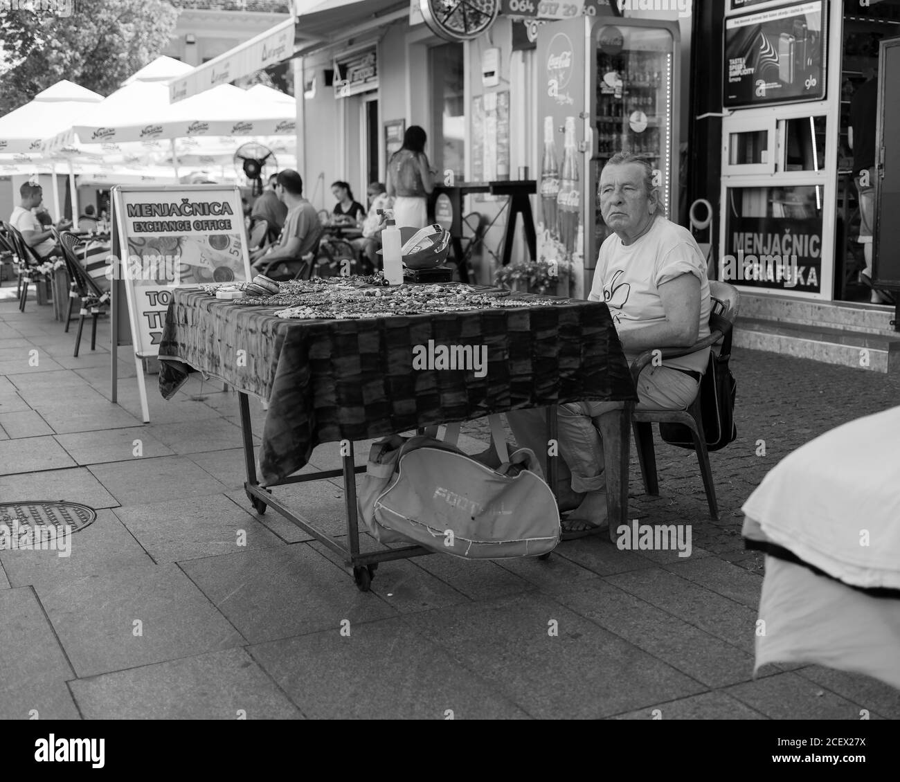 Belgrade, Serbia, Aug 13, 2020: Street vendor selling handmade jewelry at Gospodska Street in Zemun (B/W) Stock Photo