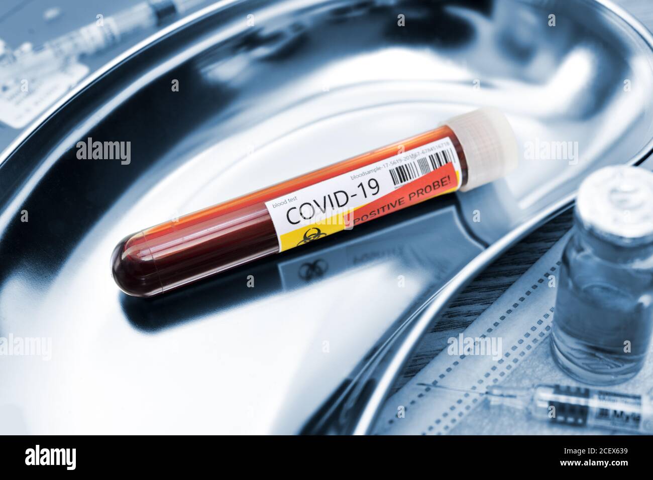 COVID-19 blood collection in a kidney dish, corona vaccination Stock Photo
