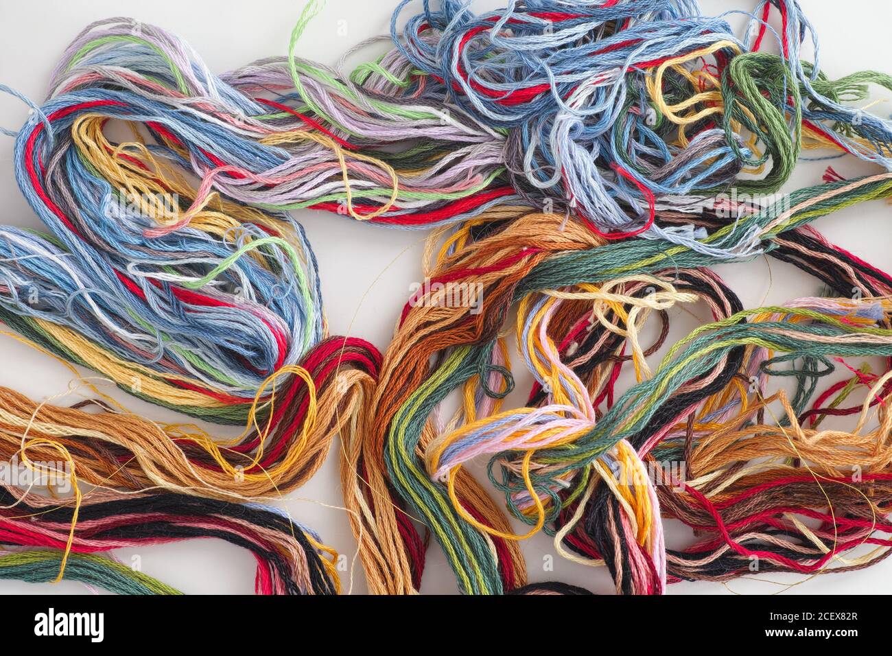 Colorful embroidery threads. Close up Stock Photo - Alamy