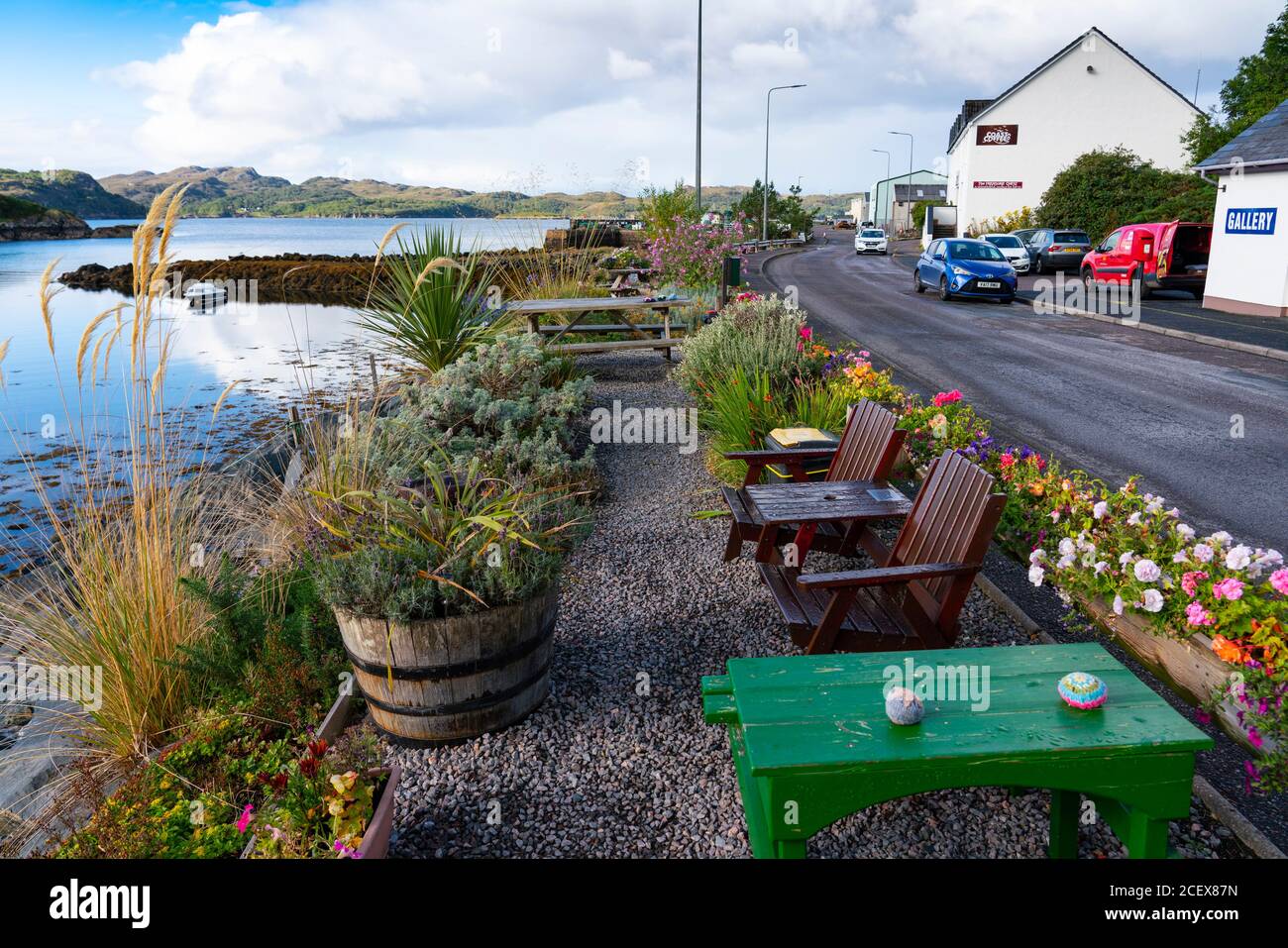 Seafront with landscaping and flowers in village of  Charlestown on Gairloch, Wester Ross, Scotland, UK Stock Photo