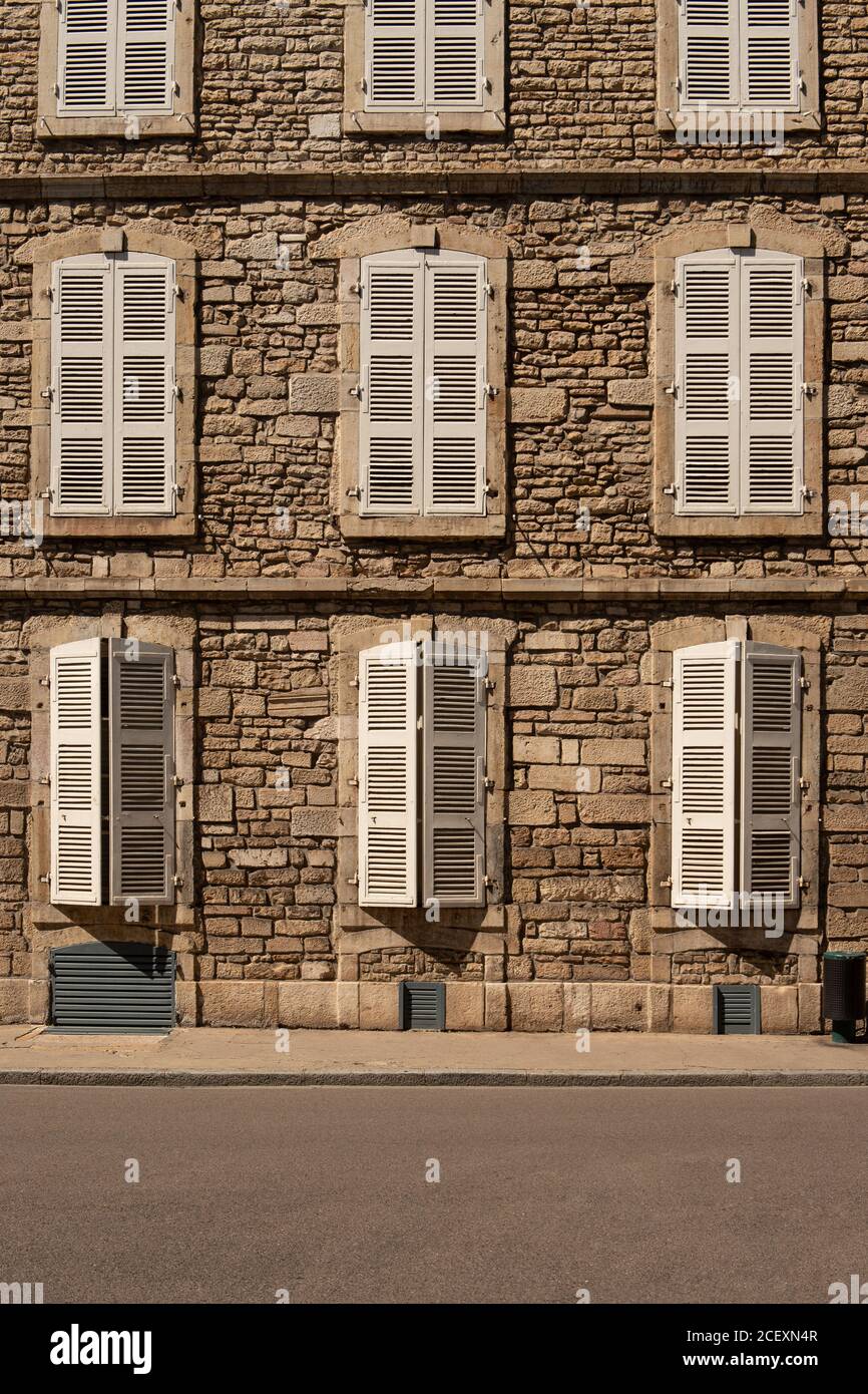 A house in Beaune and characteristic window shutters, France Stock Photo