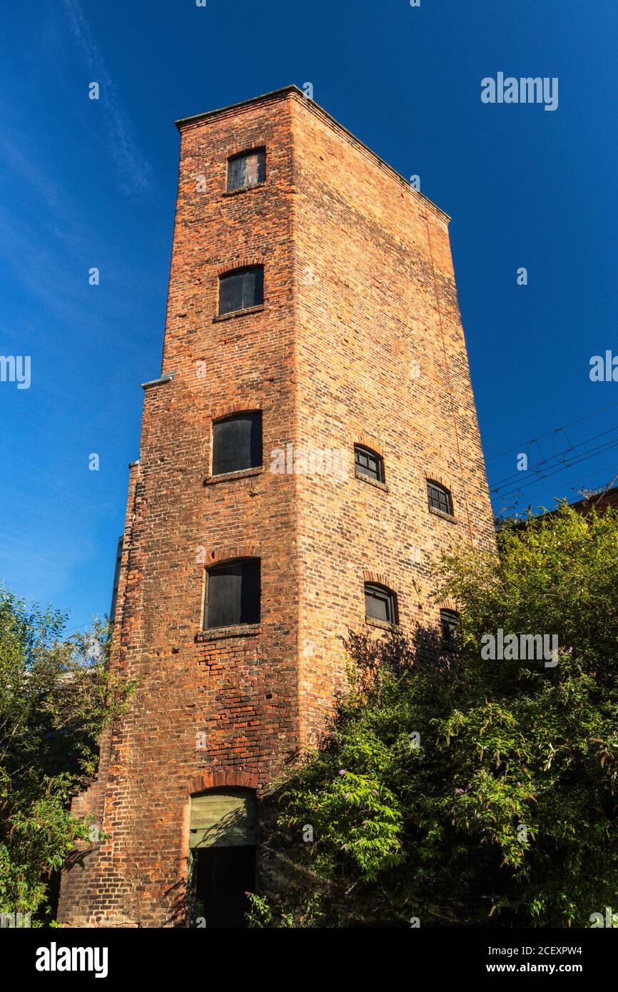 Disused mill on the Rochdale Canal, Castlefield, Manchester Stock Photo