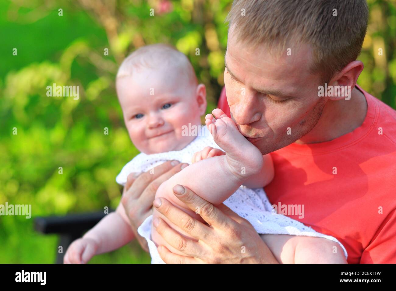 Dad and daughter in the park. Portrait of dad and child Stock Photo - Alamy