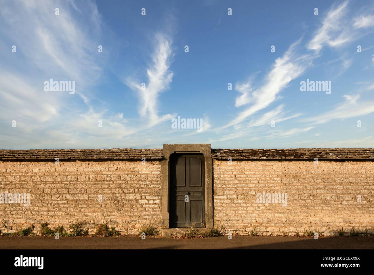 Door to nowhere and a brick wall Stock Photo
