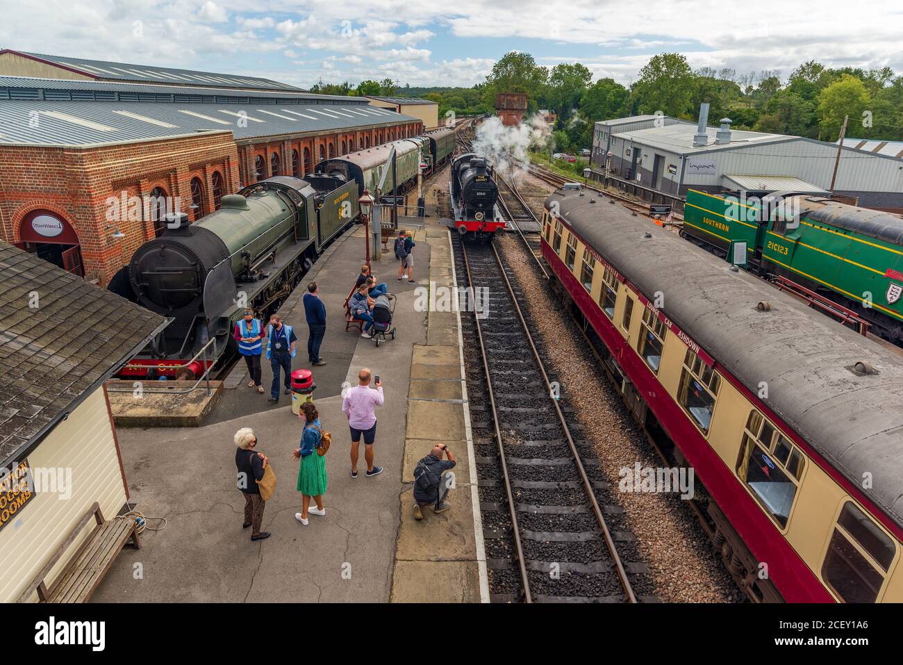Steam train and rolling stock manoeuvres on the Bluebell Railway, heritage railway line at Sheffield Park station, East Sussex, England, UK Stock Photo