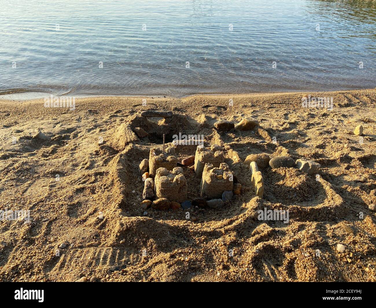 front view sand castle on the beach Stock Photo - Alamy