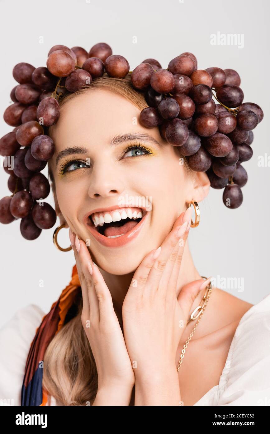 Rustic Woman Face rustic blonde woman with grapes on head laughing isolated on white ...