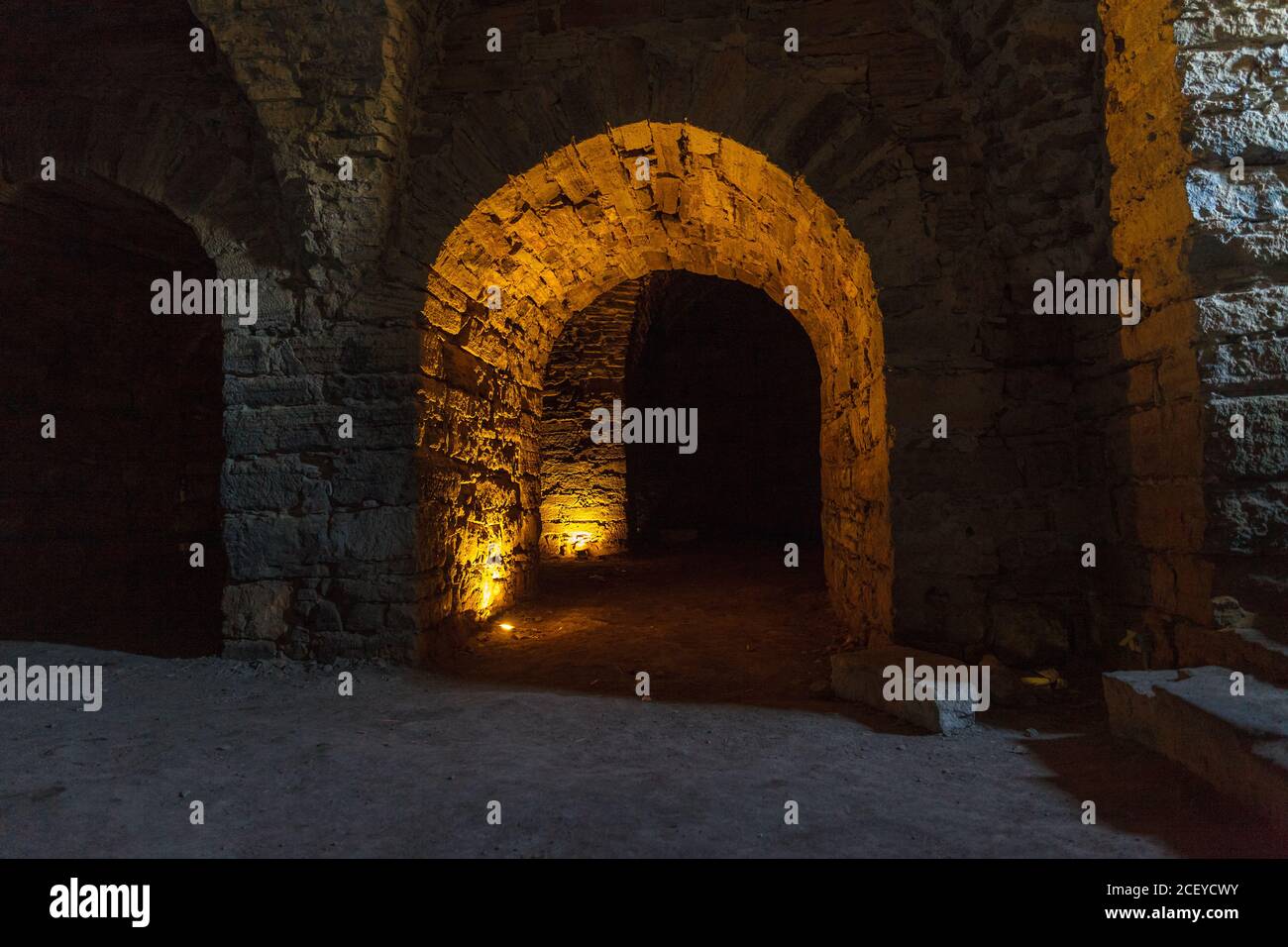 Rays of light shining into the medieval cellar Stock Photo - Alamy