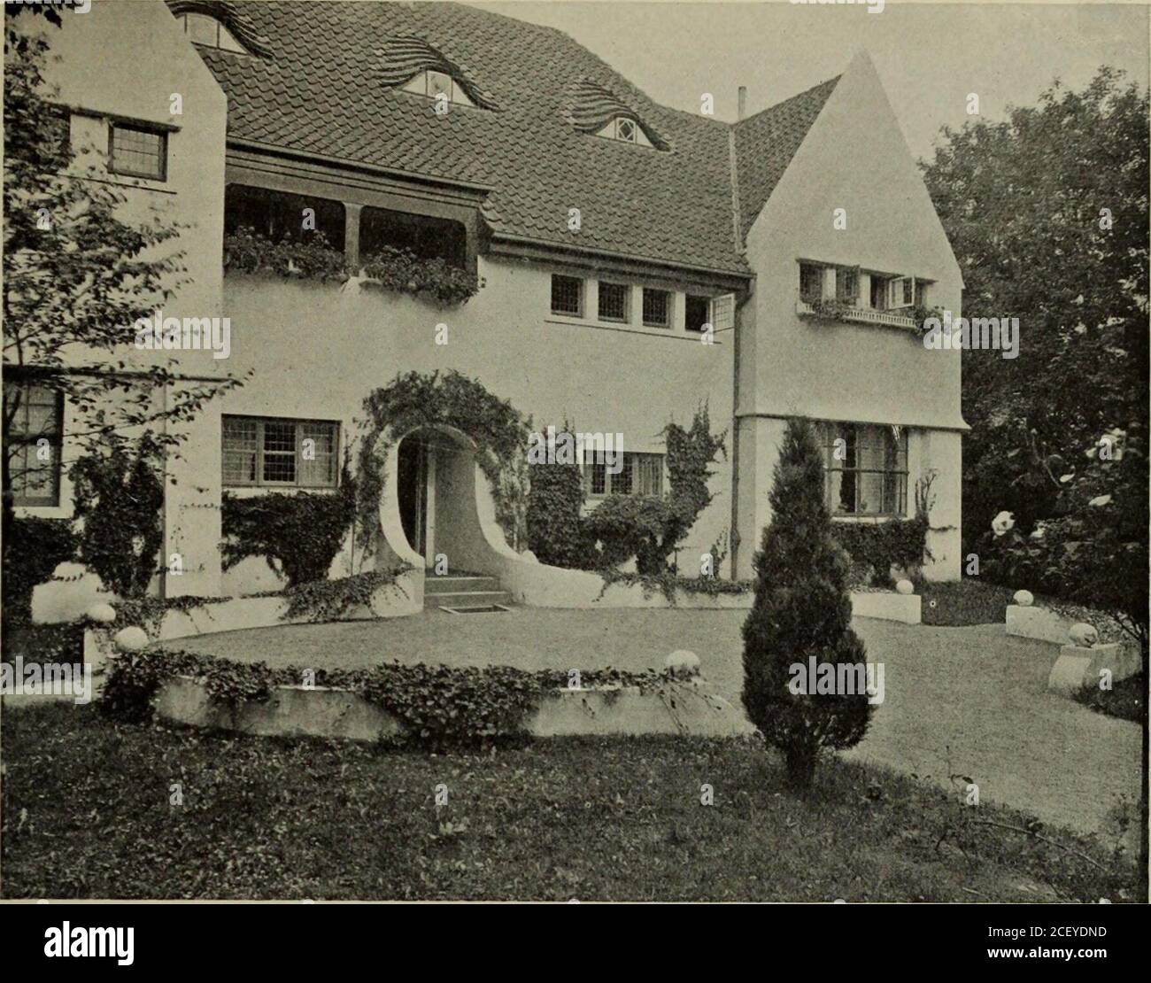 . International studio. DR. VASS.MER S COUNTRY HOUSE : GARDEN VIEW RUNGE & SCOTLAND, ARCHITECTS, BREMEN Recent Designs in Domestic Architecture. DR. VASSMER S COUNTRY HOUSE : MAIN ENTRANCE RUNGE & SCOTLAND, ARCHITECTS, BREMEN German Lloyd steamship Kronprinzessin Cecilie,which were illustrated in The Studio for December,1907 (pp. 238-240). Apropos of thework of these architects in relation todomestic architecture generally, andspecifically in regard to the designs nowillustrated, we quote the remarks of oneof our German correspondents. Two factors (he says) have played animportant part in the Stock Photo