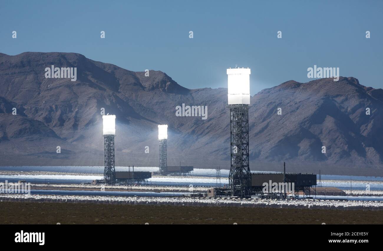The Ivanpah Solar Power Facility, a concentrated solar thermal plant  in the Mojave Desert near Ivanpah, California and Primm, Nevada, is one of the l Stock Photo