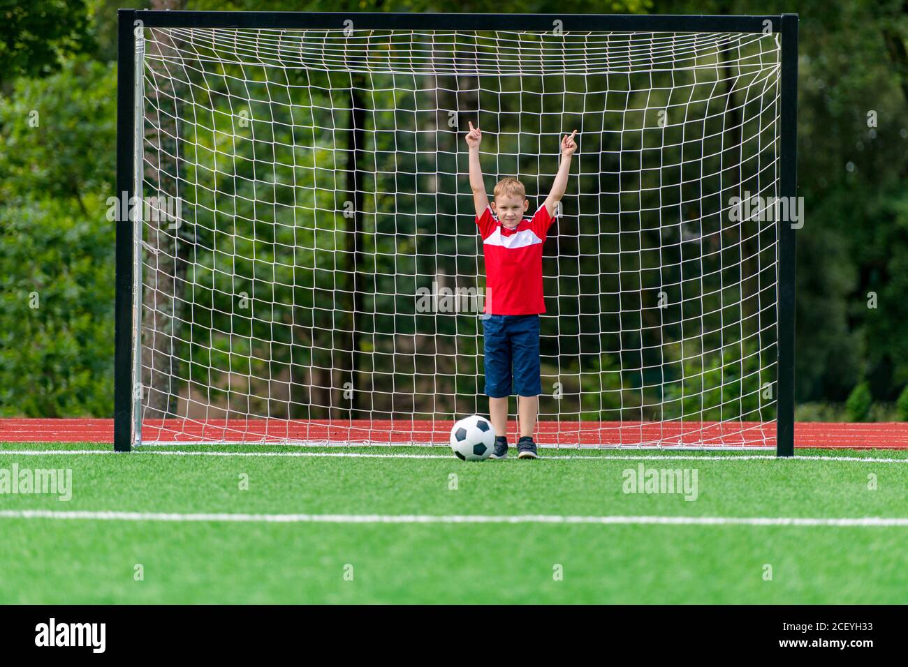 Football soccer training for kids. Young boy improving soccer skills Stock Photo Alamy