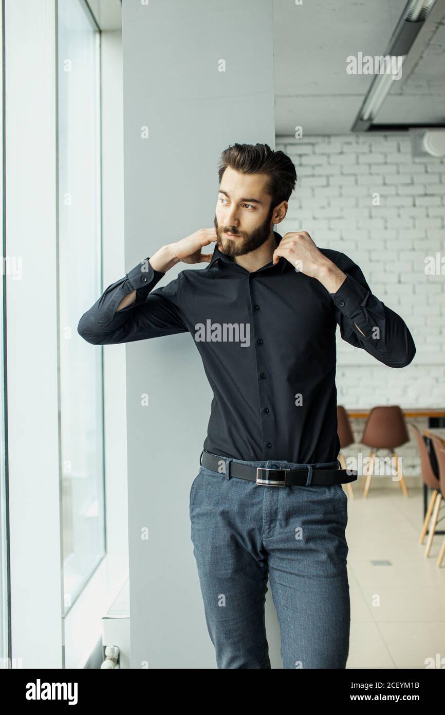 portrait of handsome man in office 