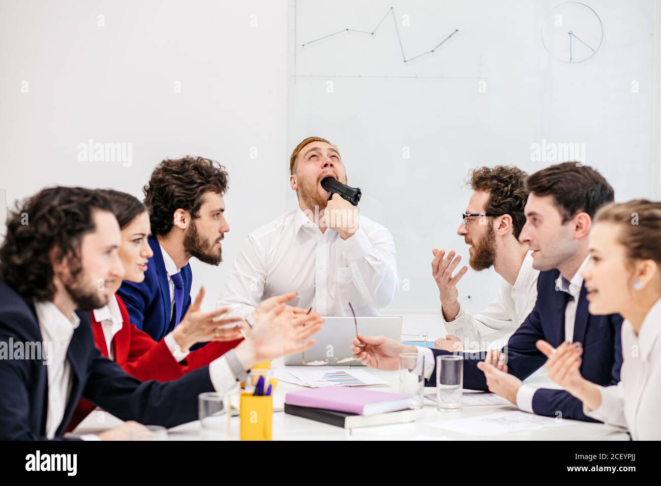 business meeting of young caucasian people, having trouble at work ...