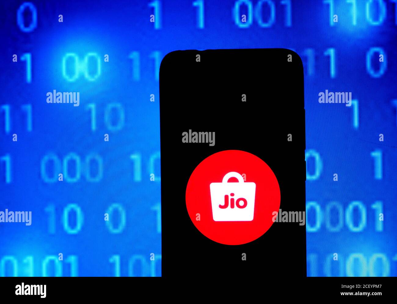 In this photo illustration a Jio company Logo seen displayed on a smartphone. Stock Photo