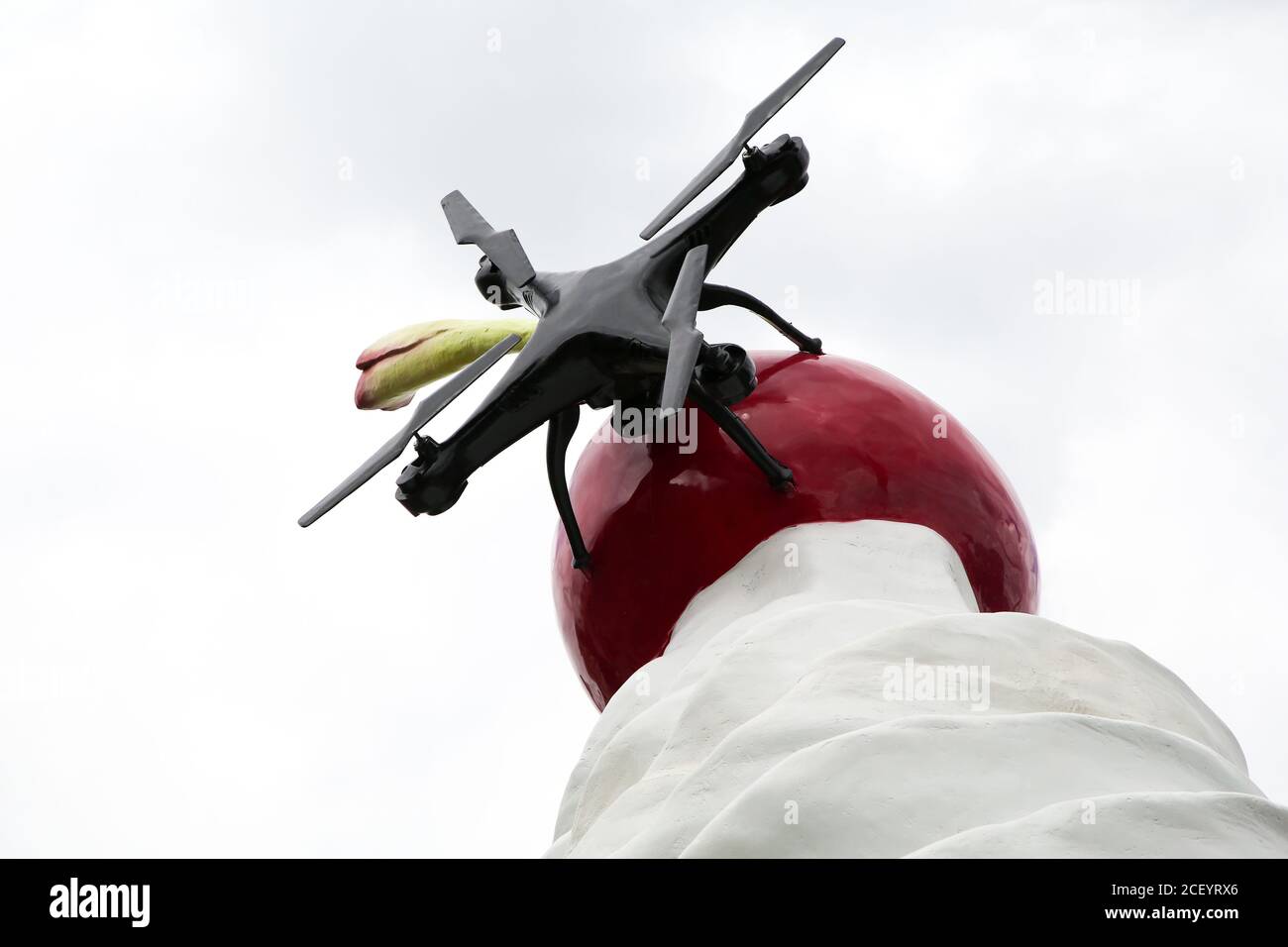 A view of a giant dollop of whipped cream topped with a cherry, a fly and a drone, a new artwork entitled 'THE END' by artist Heather Phillipson on the Fourth Plinth in London’s Trafalgar Square and will remain for the next two years. Stock Photo