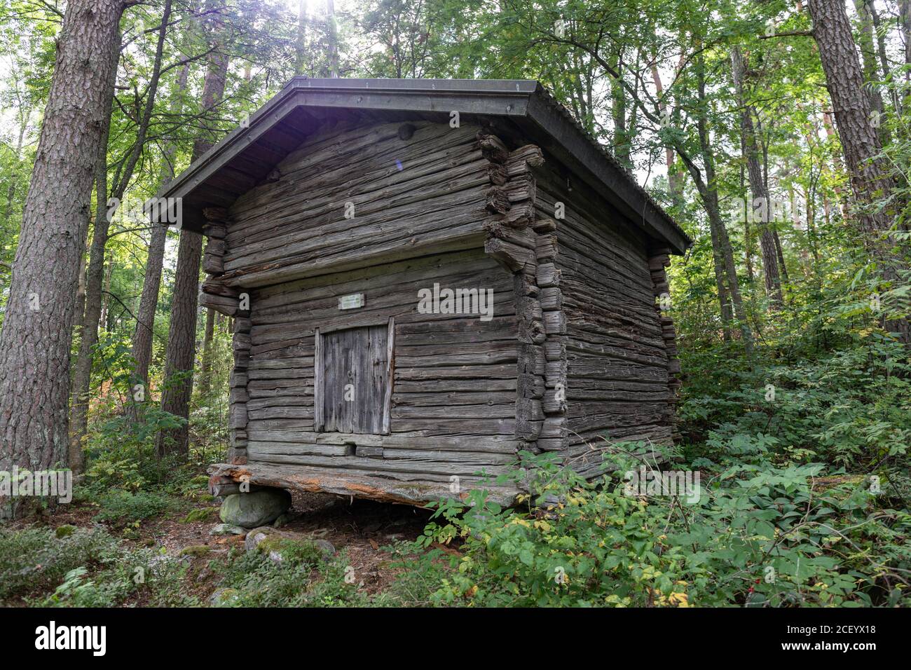 Old weathered cottager's storehouse at Kotko local history open-air museum in Hauho, Finland Stock Photo