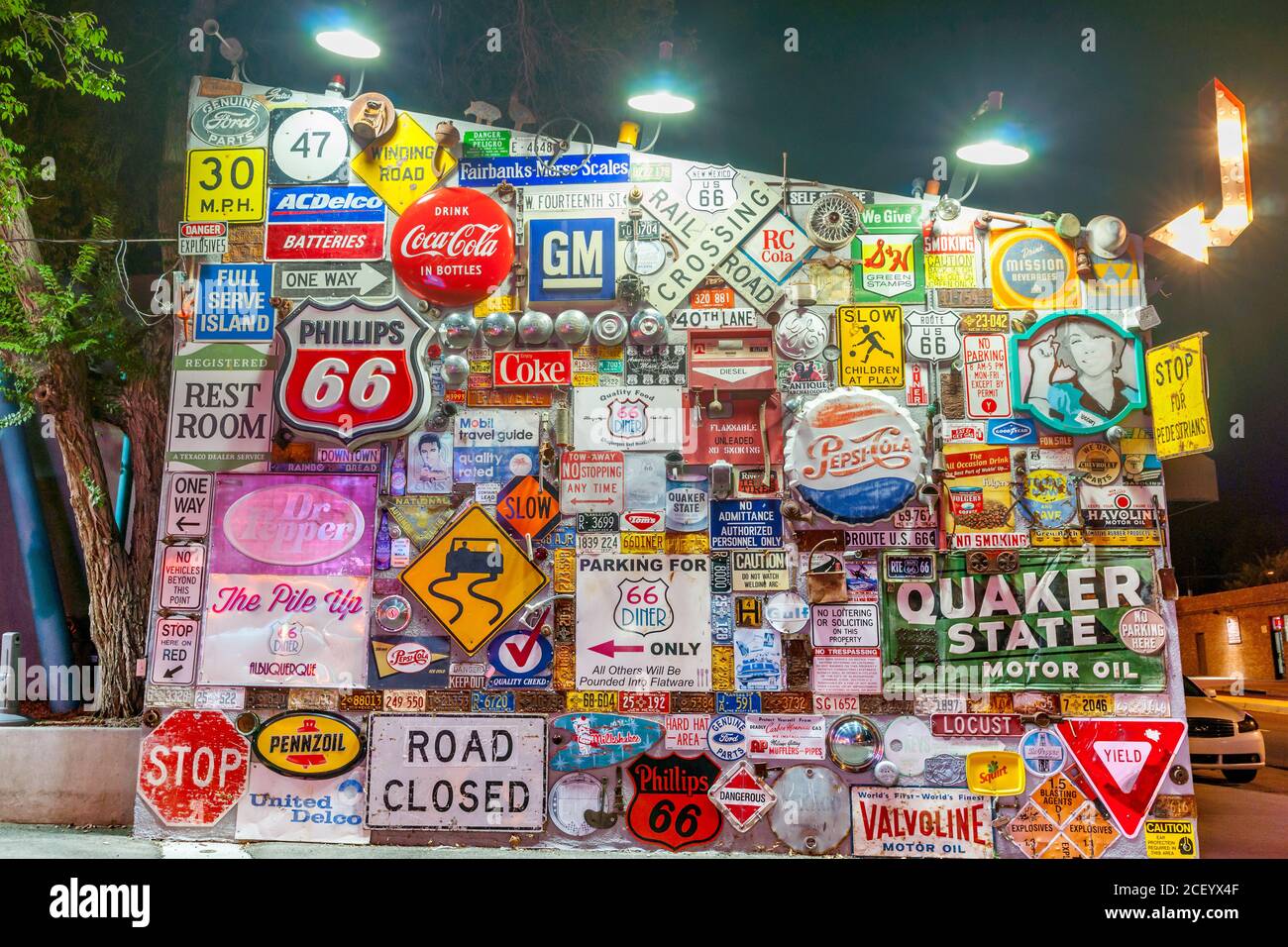 Albuquerque, New Mexico, USA. - September 19 2015; Wall of old signs and famous brands outside fr4om era of Historic Route 66, Albuquerque, New Mexico Stock Photo