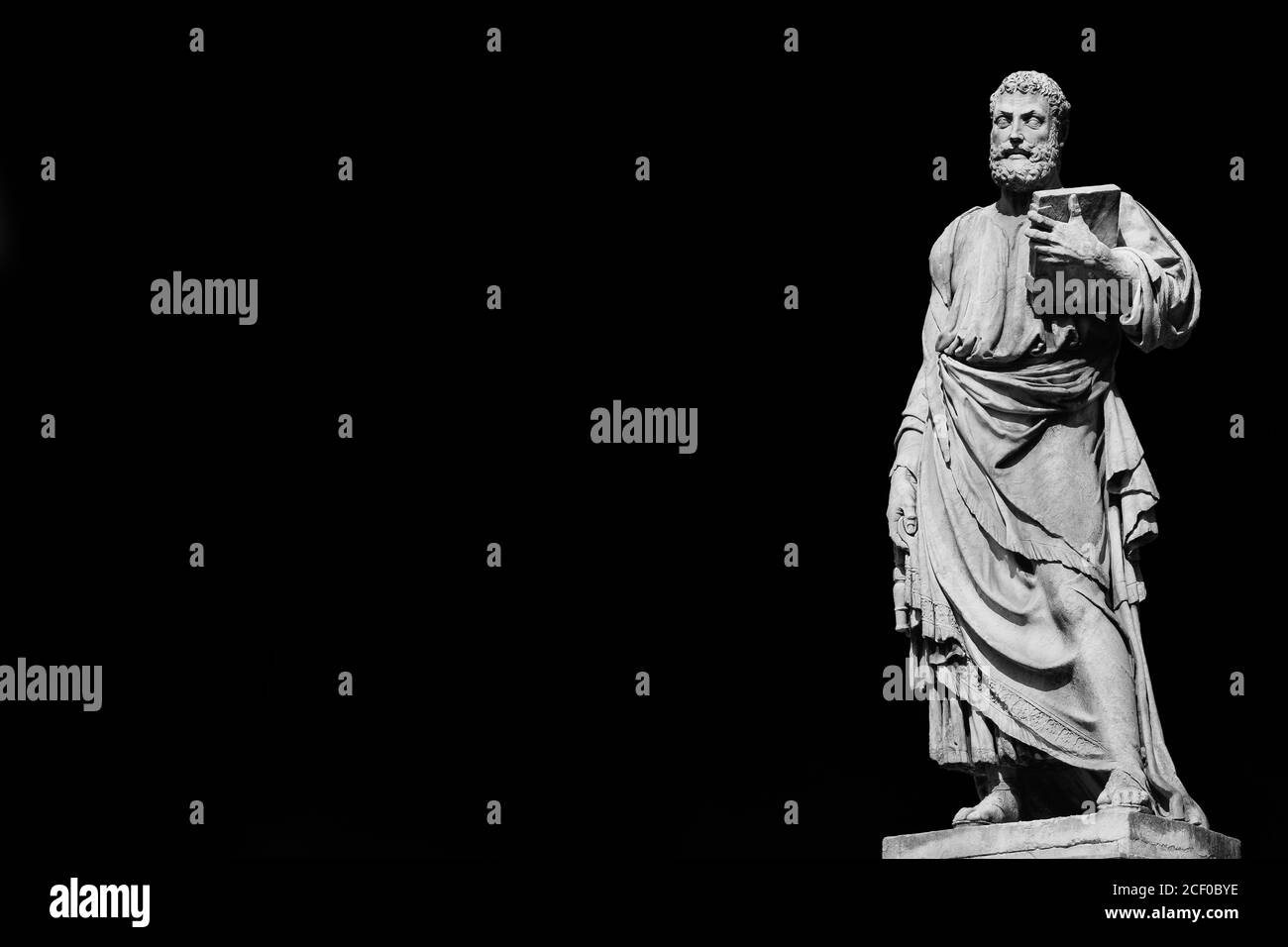 Saint Peter holding the key of heaven statue on Holy Angel Bridge in Rome, made in the 17th century by sculptor Lorenzetto (Black and White with copy Stock Photo